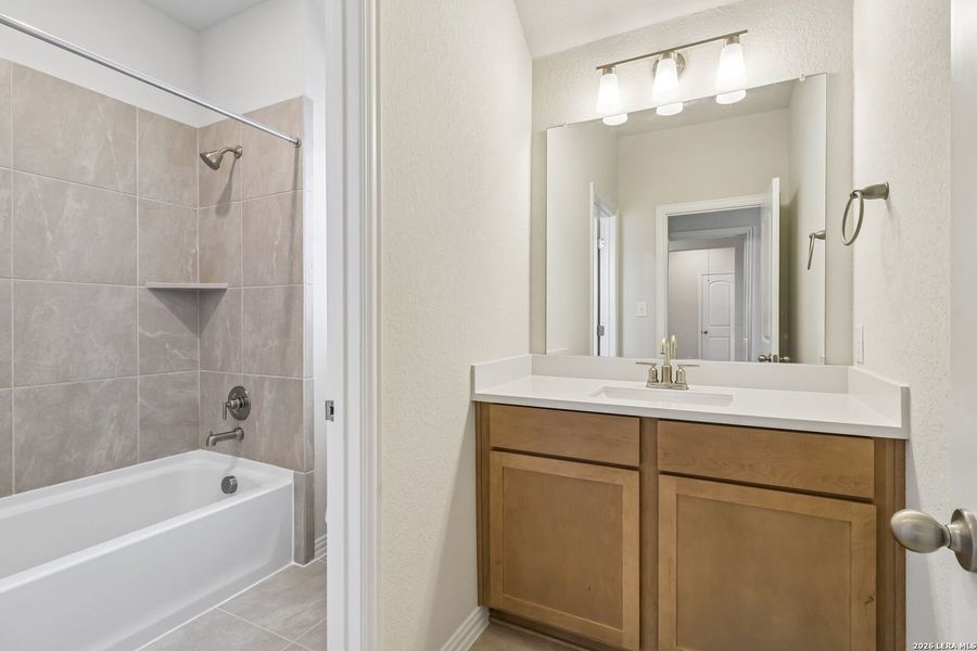 Furnished interior view inside a new home in Stream Waters, Seguin (Image 8).