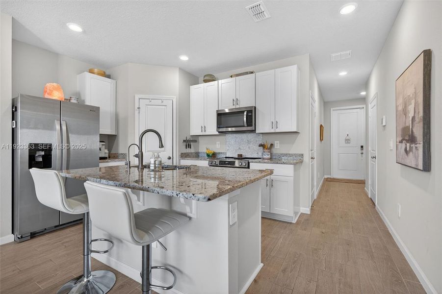 Furnished interior view inside a new home in , Stuart (Image 14). Furnished interior view inside a new home in , Stuart (Image 14).