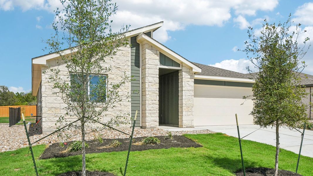 Front exterior of a new home in Trails at Wildhorse, Austin, TX, highlighting curb appeal (Image 19).