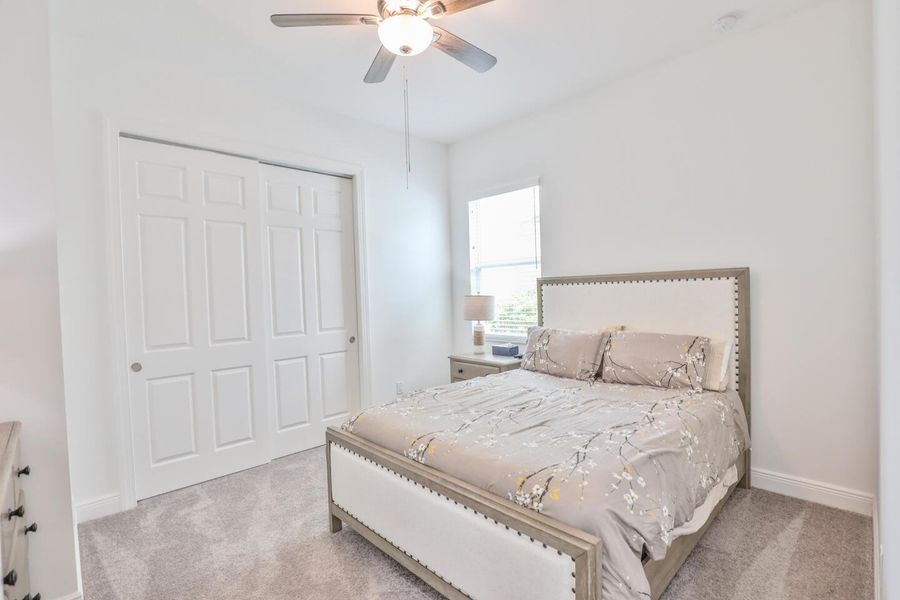 Furnished interior view inside a new home in PGA Village Verano, Port St. Lucie (Image 33).