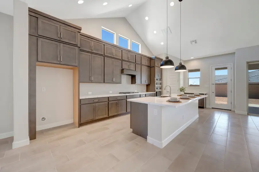 Furnished interior view inside a new home in Sentiero at Windrose, Waddell (Image 6).