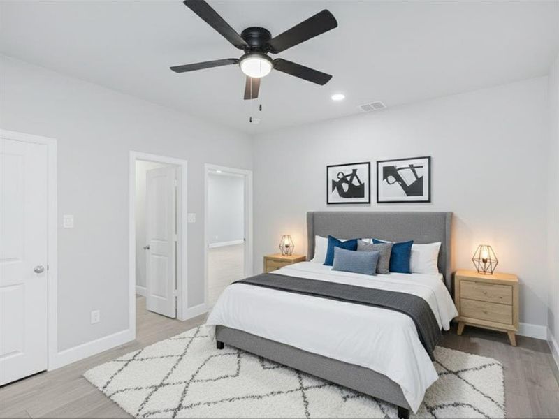Bedroom with ceiling fan, light wood-style floors, and recessed lighting