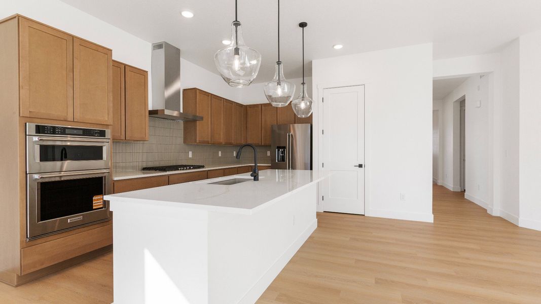 Furnished interior view inside a new home in Dillon Pointe - Journey, Broomfield (Image 14).