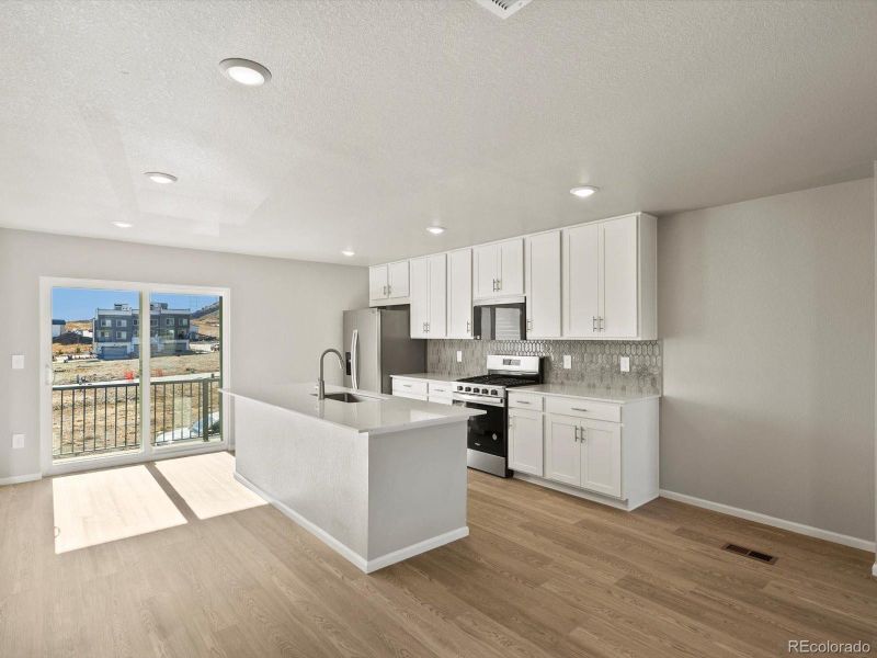Furnished interior view inside a new home in Three Hills, Morrison (Image 14).