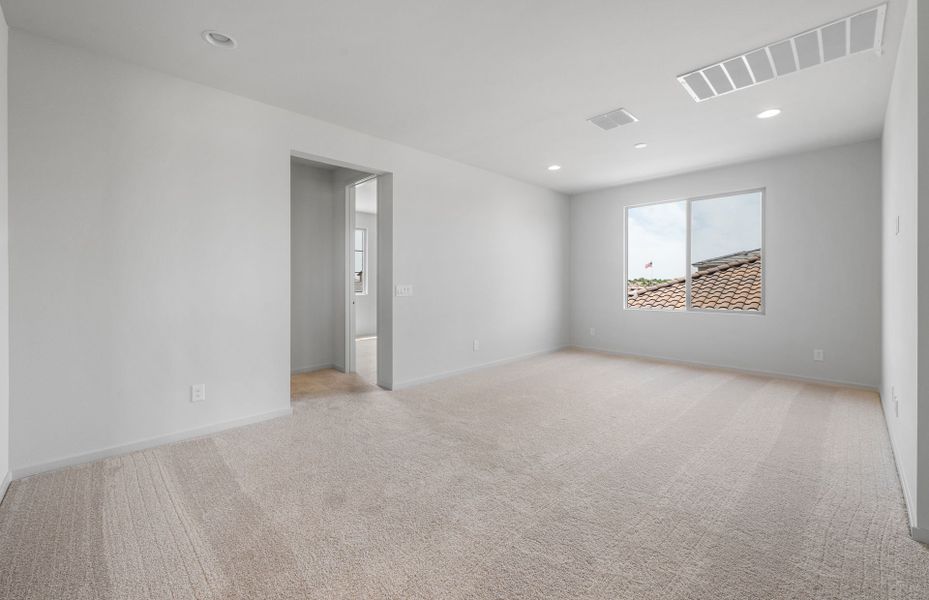 Spacious, unfurnished interior of a new home in Legado West, Queen Creek (Image 17).