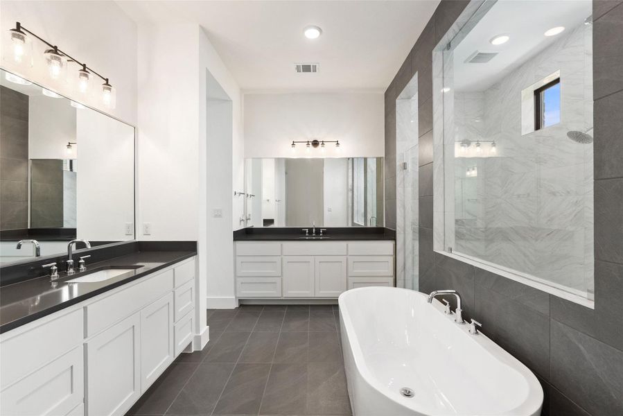 Furnished interior view inside a new home in The Estates at Rough Hollow Vista Ridge, Lakeway (Image 26).
