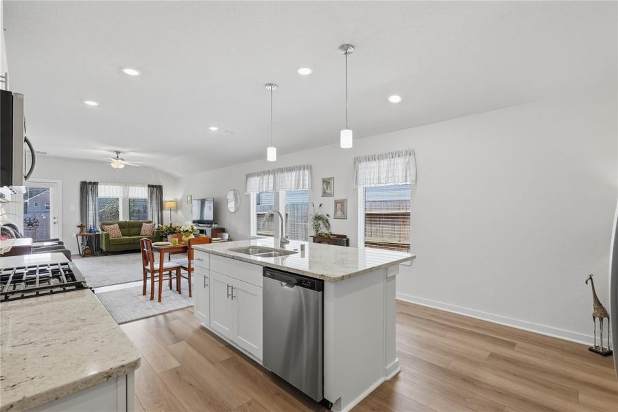 The large island island offers extra counter & cabinet space.
