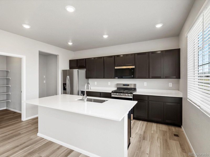 Furnished interior view inside a new home in Buffalo Highlands: The Canyon Collection, Commerce City (Image 7).