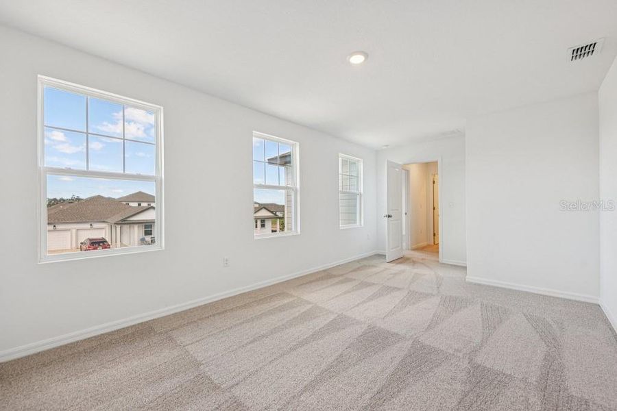 Spacious, unfurnished interior of a new home in Northlake at Ovation, Winter Garden (Image 29). Spacious, unfurnished interior of a new home in Northlake at Ovation, Winter Garden (Image 29).