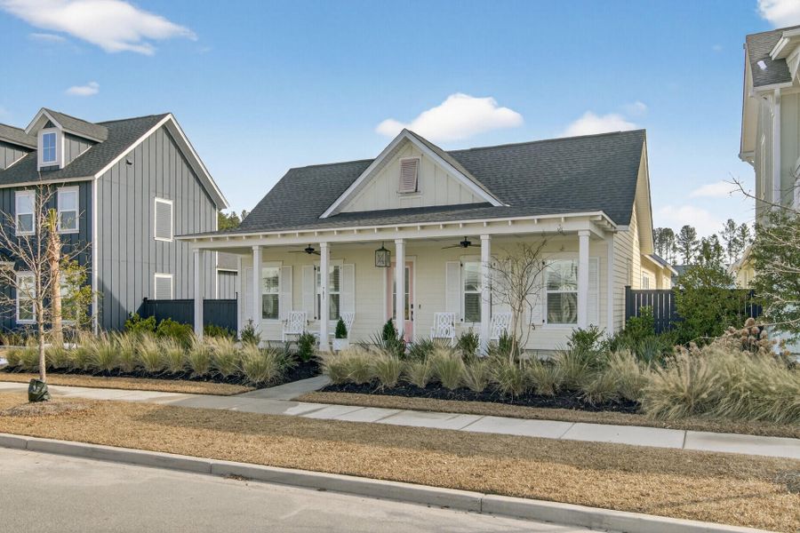 Front exterior of a new home in The Domus Collection at Midtown Nexton, Summerville, SC, highlighting curb appeal (Image 30). Front exterior of a new home in The Domus Collection at Midtown Nexton, Summerville, SC, highlighting curb appeal (Image 30).