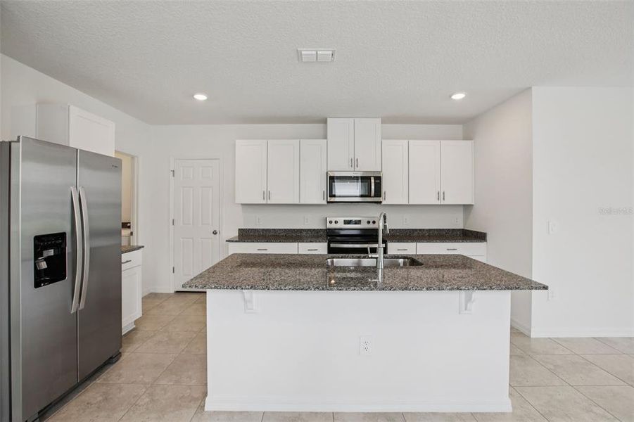 Furnished interior view inside a new home in Villamar - Classic Series, Winter Haven (Image 11).