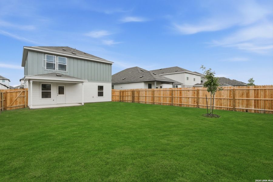 Exterior details and patio area of a home in Dove Song, Marion (Image 17).