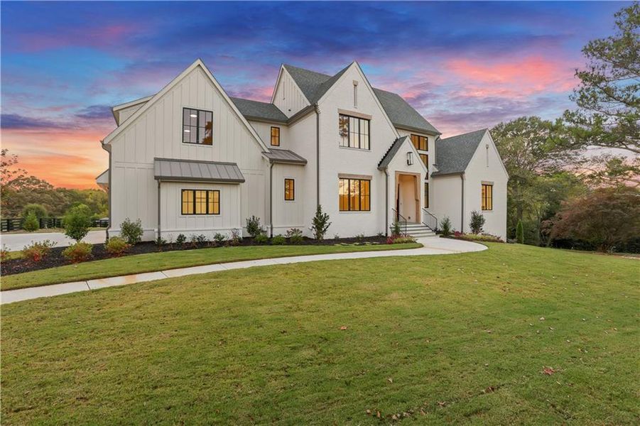 Front exterior of a new home in , Canton, GA, highlighting curb appeal (Image 1).