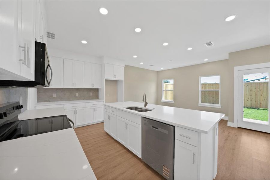 Furnished interior view inside a new home in , The Colony (Image 10).