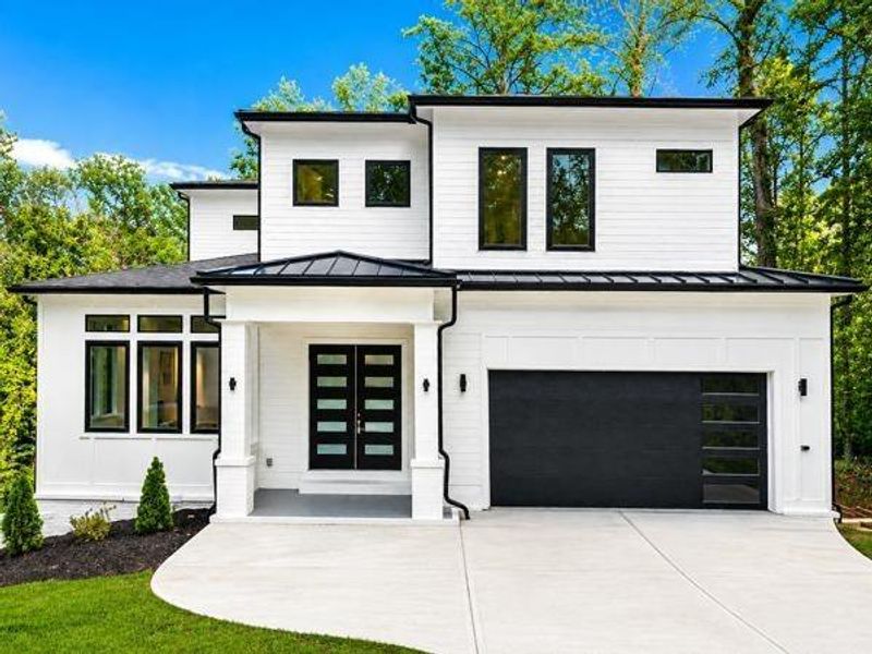 Front exterior of a new home in , Atlanta, GA, highlighting curb appeal (Image 34).