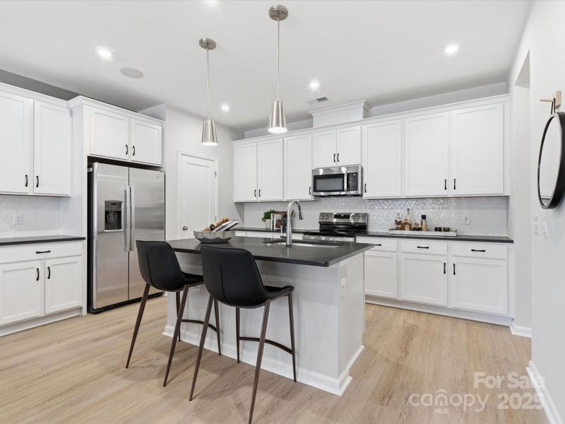 Chef's Dream Kitchen Layout. *Model Photos | Actual Finishes, Structural Selections, and Orientation May Vary.