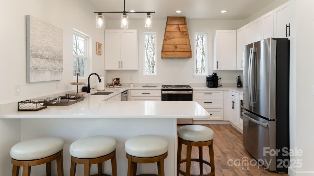 Furnished interior view inside a new home in , Waynesville (Image 27).