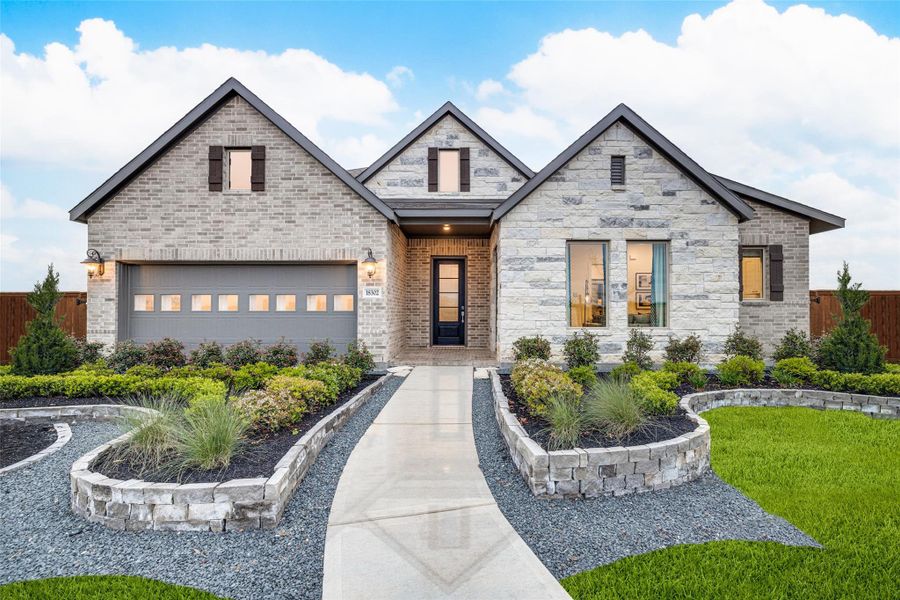 Front exterior of a new home in Anniston, Katy, TX, highlighting curb appeal (Image 23).