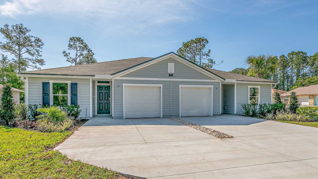 Representative exterior photo of a completed home built from the Surfside by D.R. Horton in Palm Coast Villas, Palm Coast, FL (Image 21).