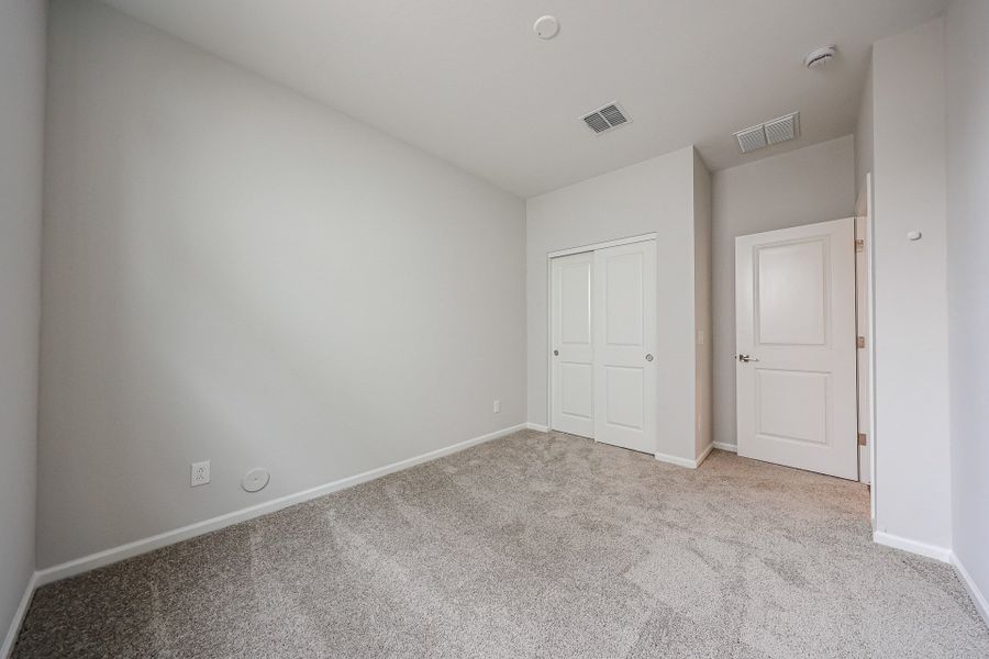 A room with white doors.