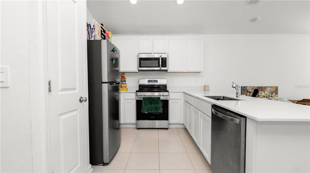 Furnished interior view inside a new home in Peace Creek Reserve: Legacy Collection, Winter Haven (Image 17).