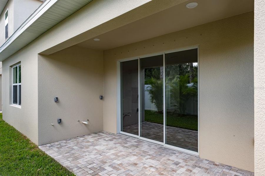 Exterior details and patio area of a home in , Palm Harbor (Image 2).