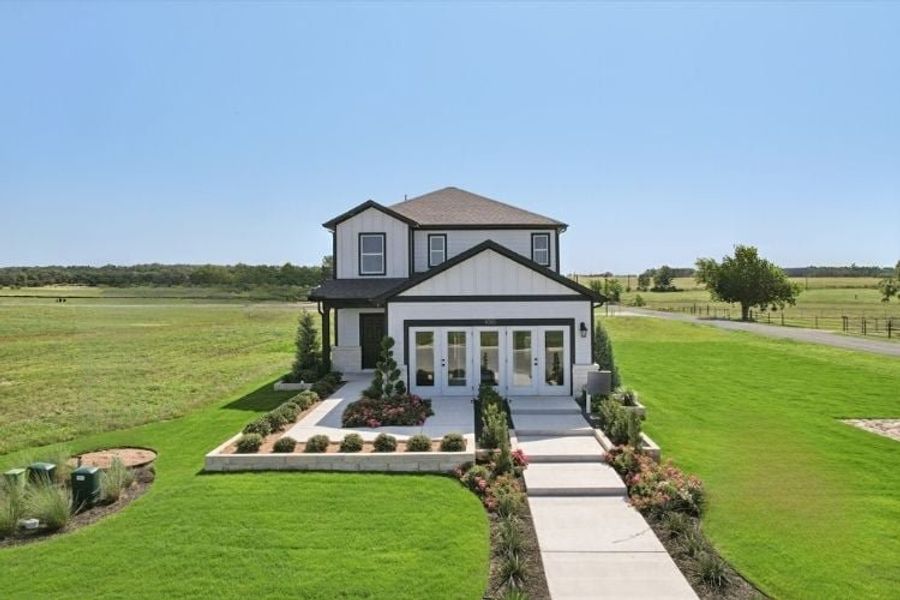 Representative exterior photo of a completed home built from the Hampton by Century Communities in Trinity Ranch, Elgin, TX (Image 1). Representative exterior photo of a completed home built from the Hampton by Century Communities in Trinity Ranch, Elgin, TX (Image 1).
