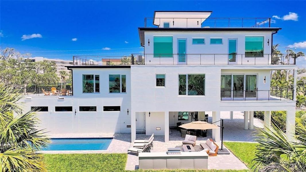 Exterior details and patio area of a home in , Sarasota (Image 24).
