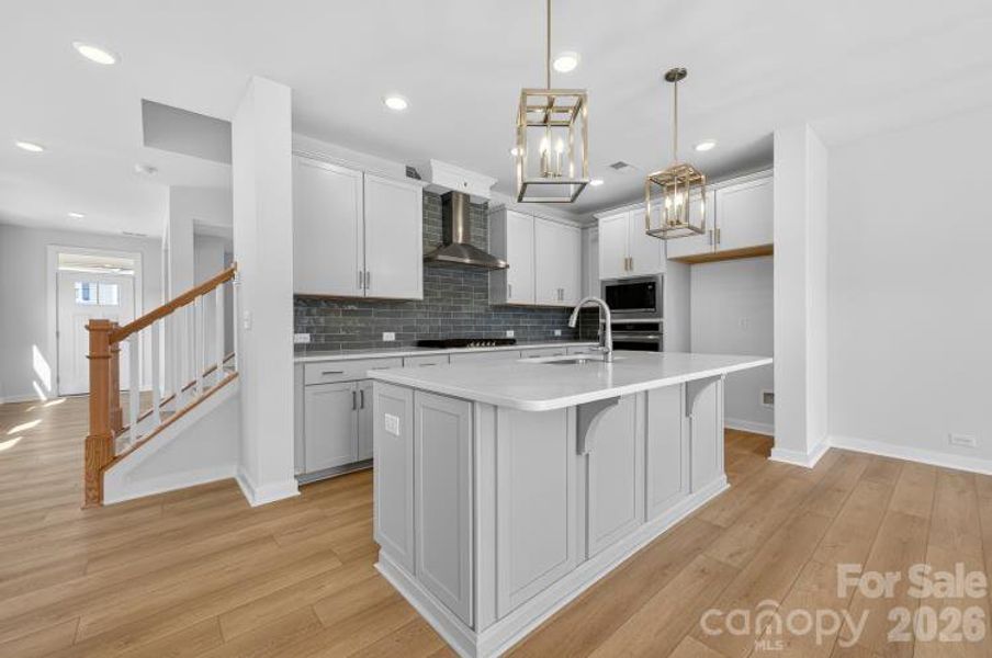 Furnished interior view inside a new home in North Creek Village - Townhomes, Huntersville (Image 6).