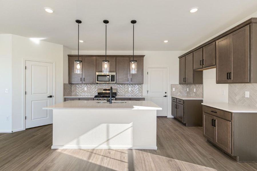 Furnished interior view inside a new home in Murphy Creek Reserve, Aurora (Image 5).