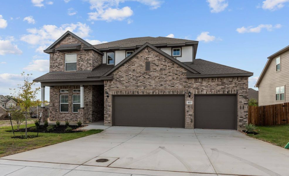 Front exterior of a new home in Buffalo Crossing – New Phase Now Preselling, Cibolo, TX, highlighting curb appeal (Image 21).