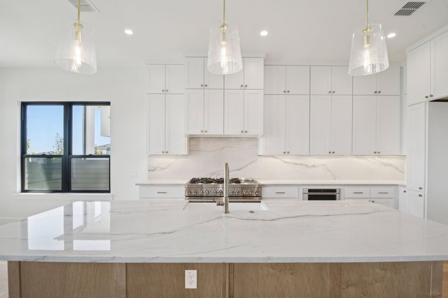 Furnished interior view inside a new home in Milky Way at River Place, Austin (Image 18).