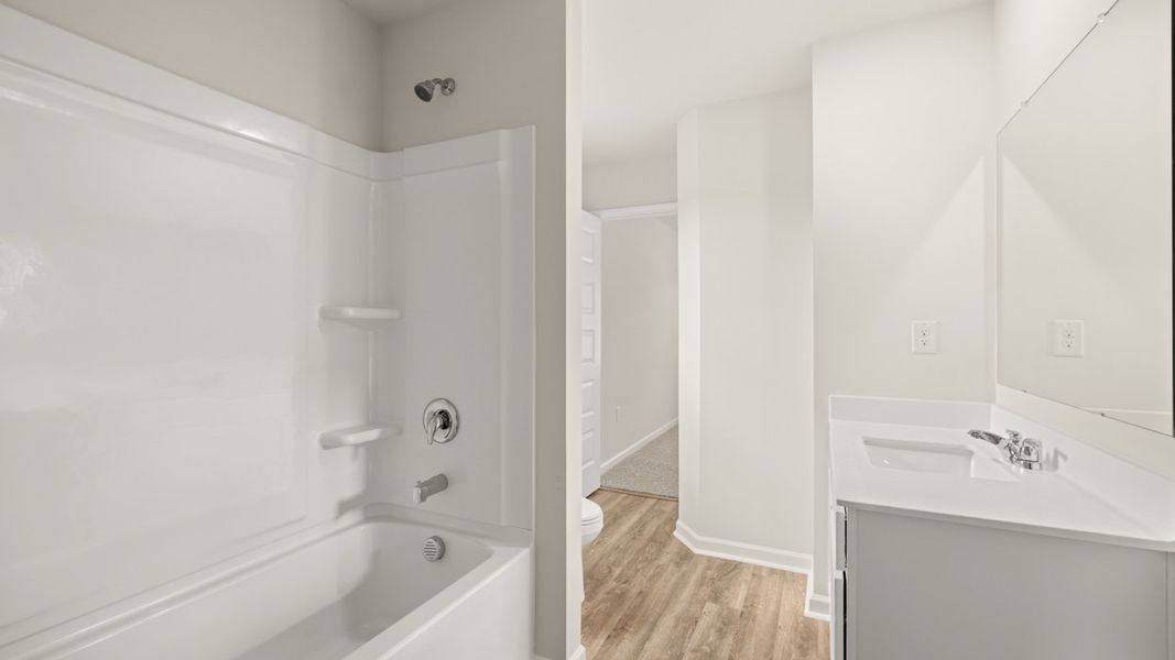 Spacious, unfurnished interior of a new home in Preserve at Dove Creek, Statham (Image 34).