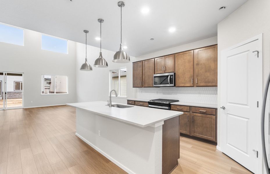 Furnished interior view inside a new home in Harvest Crossing, Aurora (Image 7).