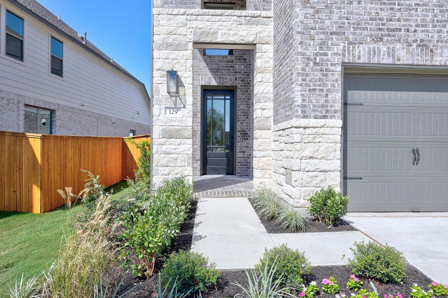 Exterior details and patio area of a home in Parmer Ranch, Georgetown (Image 3). Exterior details and patio area of a home in Parmer Ranch, Georgetown (Image 3).