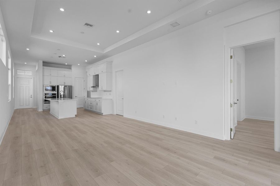 Furnished interior view inside a new home in PGA Village Verano, Port St. Lucie (Image 17).