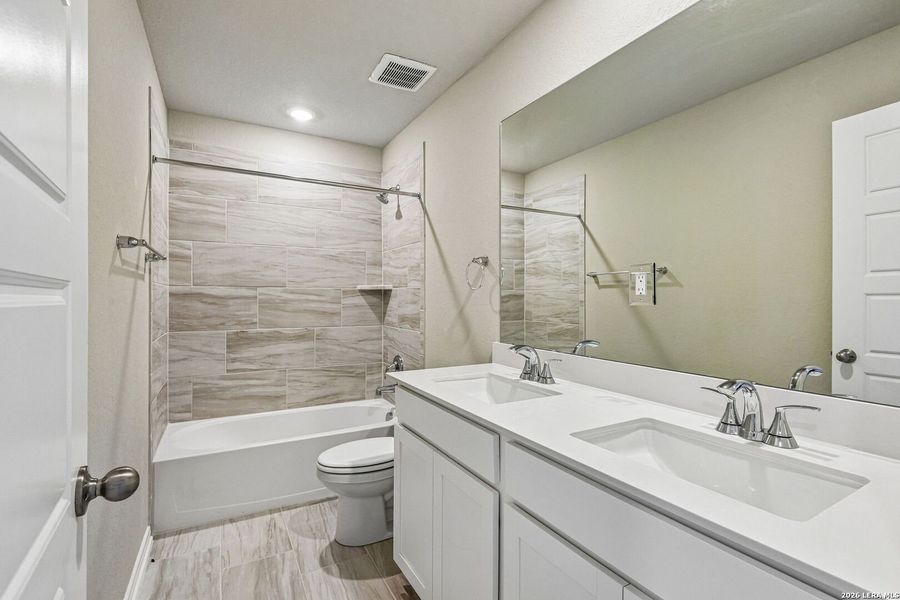 Furnished interior view inside a new home in Royal Crest, San Antonio (Image 10).