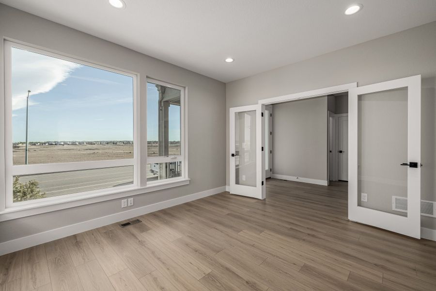 Spacious, unfurnished interior of a new home in West Grange, Longmont (Image 38).