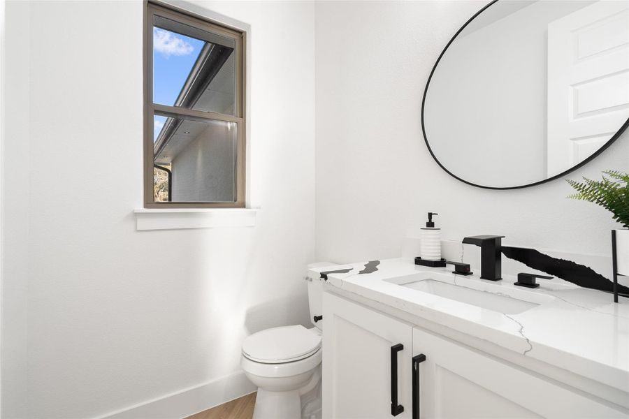 Bathroom with vanity and light wood-style flooring