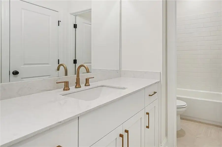 Furnished interior view inside a new home in Ward's Crossing Townhomes, Johns Creek (Image 6).