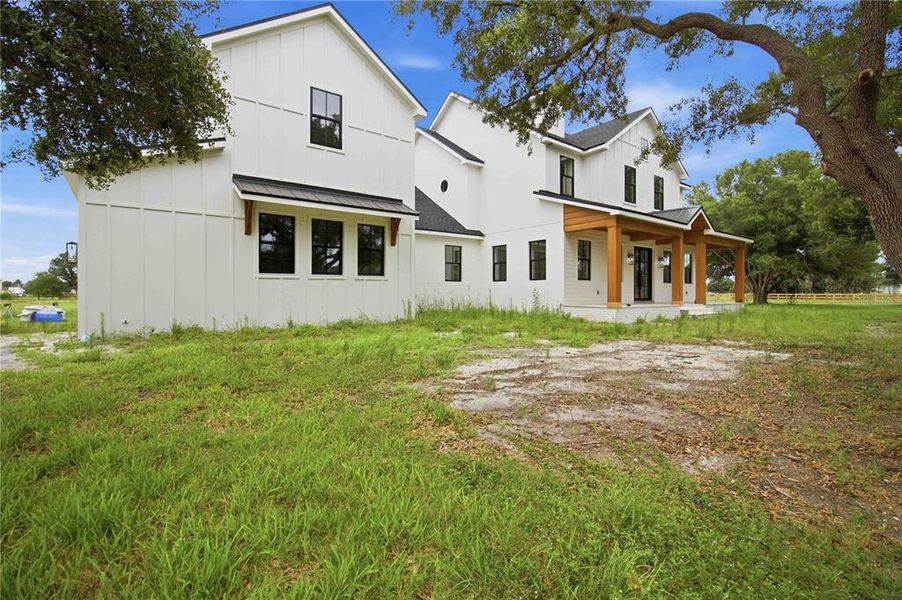 Exterior details and patio area of a home in , Sarasota (Image 17).