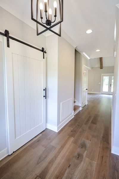 Spacious, unfurnished interior of a new home in Baker Road, Birchwood (Image 56).