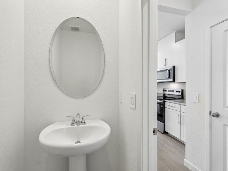 Furnished interior view inside a new home in The District at Oakleaf - The Commons, Middleburg (Image 6).