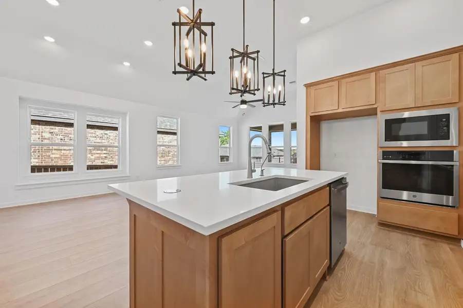 Furnished interior view inside a new home in 6 Creeks at Waterridge, Kyle (Image 9).