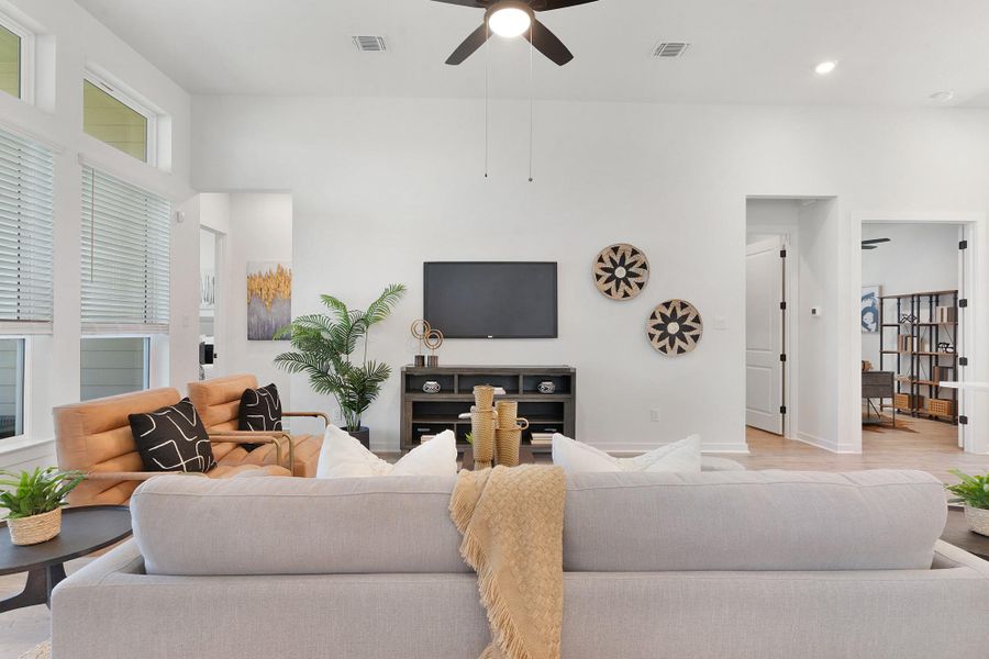 High ceilings and recessed lighting define this airy open floorplan layout.