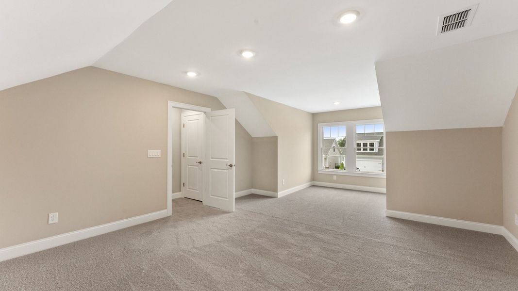 Spacious, unfurnished interior of a new home in The Courtyards at Bailey Farms, Dacula (Image 26).