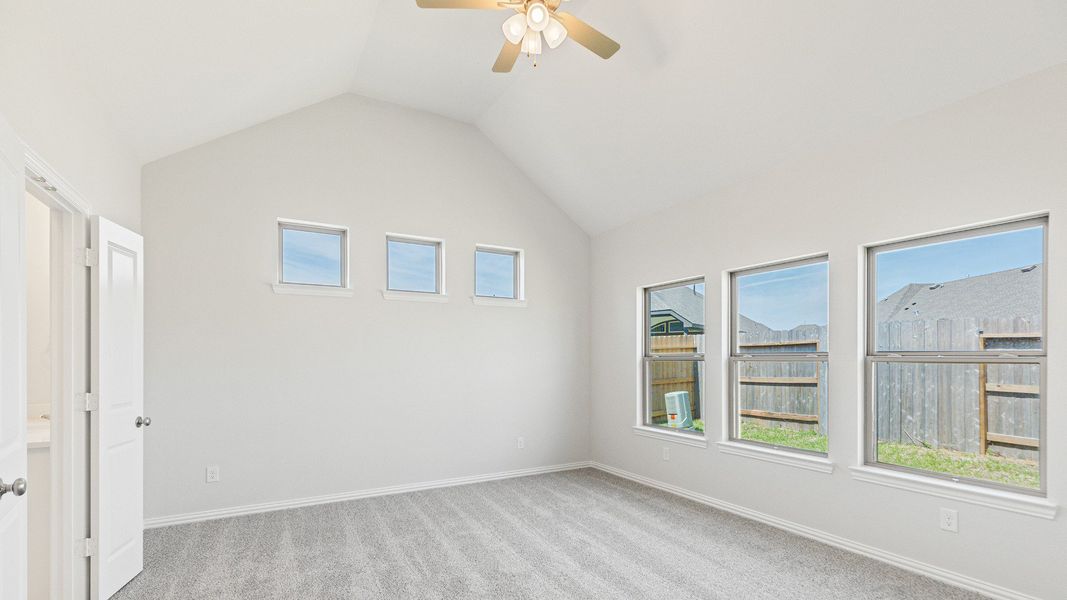 Furnished interior view inside a new home in Sunterra, Katy (Image 5).