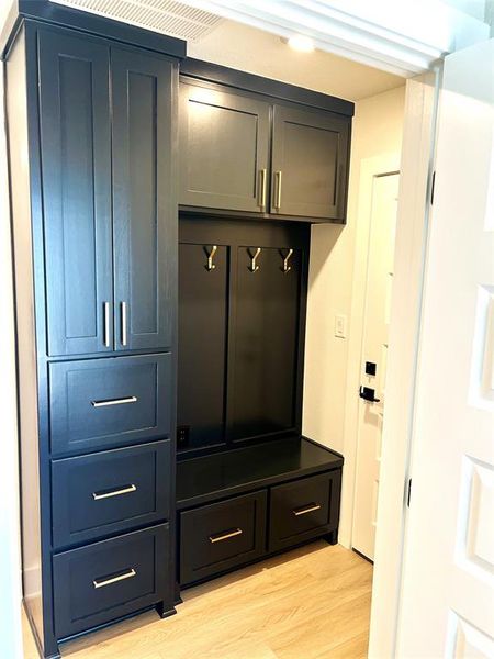 Mudroom with light wood finished floors Mudroom with light wood finished floors