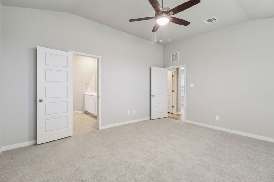 Spacious, unfurnished interior of a new home in Legendary Trails - Premier Series, Cibolo (Image 13).