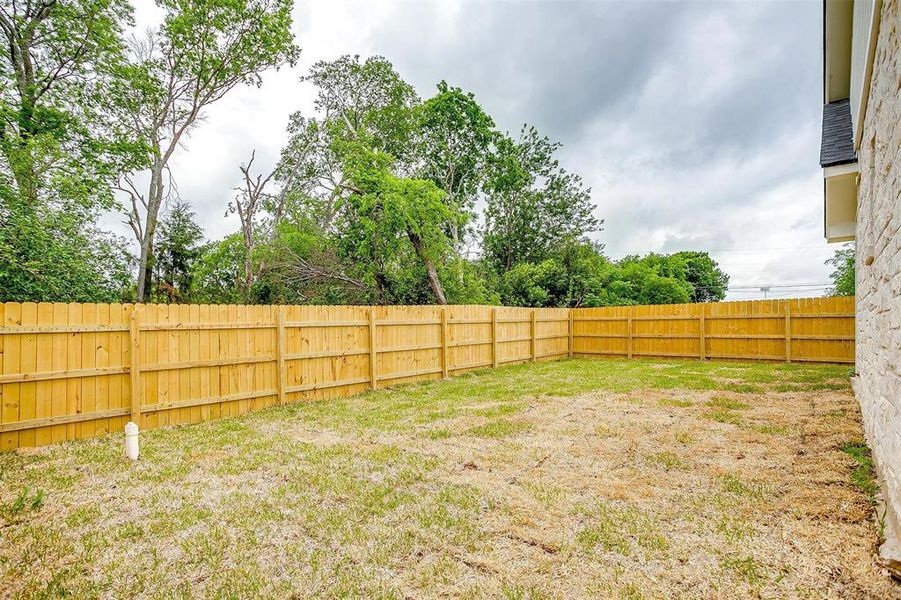 View of yard featuring a fenced backyard View of yard featuring a fenced backyard